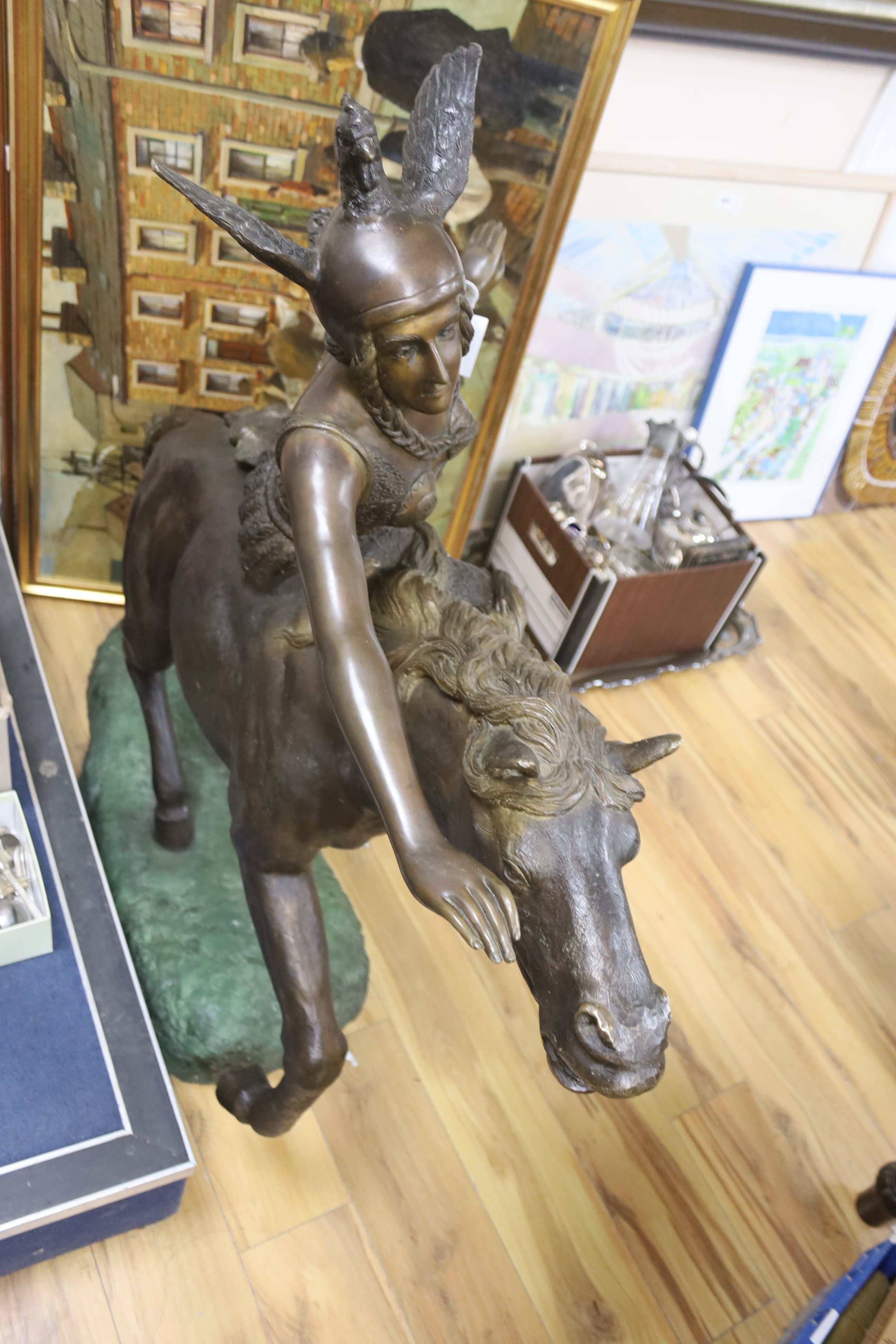 A large bronze of a Valkyrie on horseback, width 135cm height 122cm